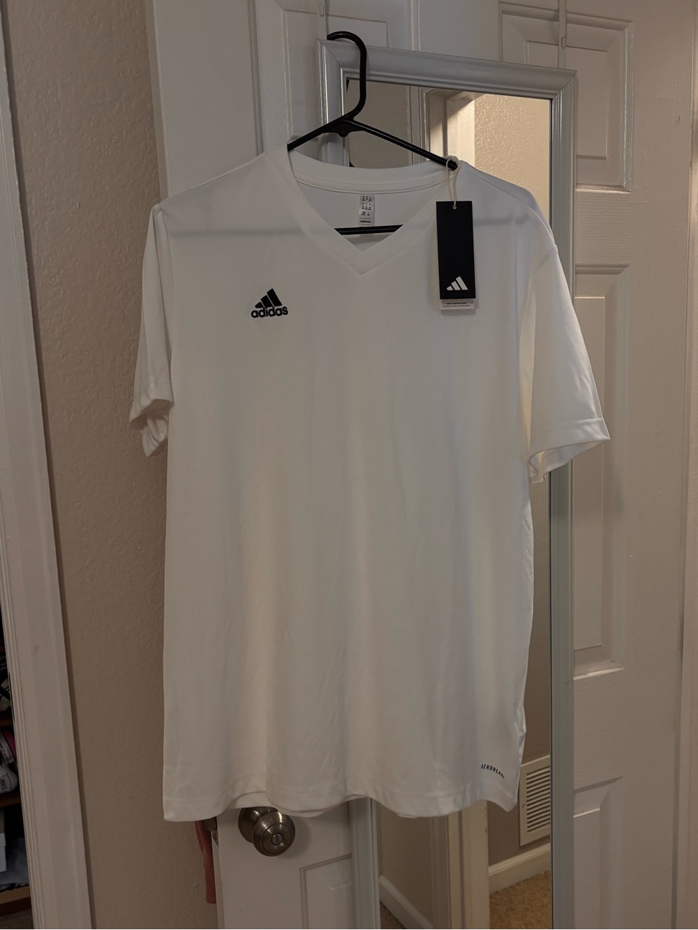 New white adidas soccer shirt